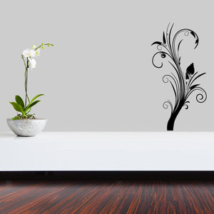 Black floral swirl wall decal with ornate vine and leaf accents