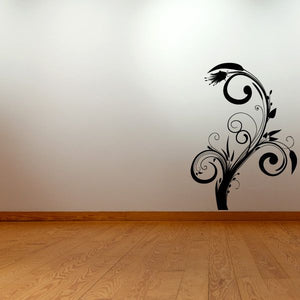 Black floral swirl vinyl wall decal with bird silhouette and scrollwork