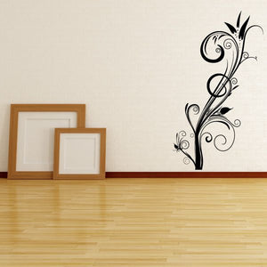 Black floral swirl wall decal with scrollwork and small blossoms