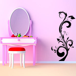 Black floral swirl wall decal with ornate vine and curls