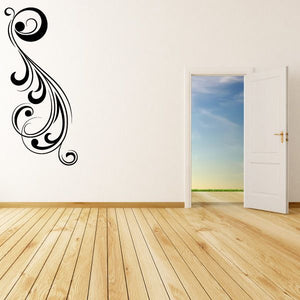 Black floral swirl vinyl wall decal with curved scroll design