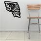 Black stylized flower wall decal with layered petals and circular accents
