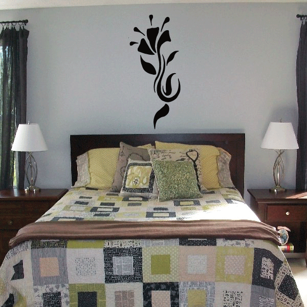 Black flower wall vinyl decal with swirling stem and three blossoms