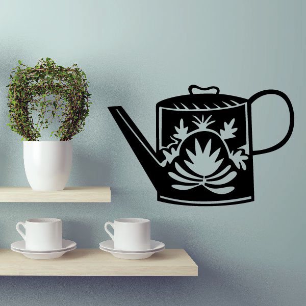 Flower watering can wall decal: black can with white flower and plant pattern