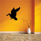 Black goose decal silhouette with trailing wavy line