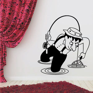 Fly fishing cartoon wall decal of angler holding a fishing rod and reel