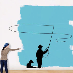 Fly fishing with dog decal featuring fisherman silhouette holding a rod and a seated dog