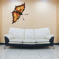 Yellow flying butterfly wall decal with detailed wings spread