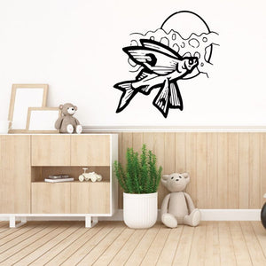 Flying fish and moon wall decal with black line art on a white wall