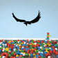Flying hawk decal with black silhouette in mid-flight, wings spread