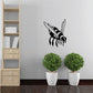 Flying honey bee wall decal with black and white winged design