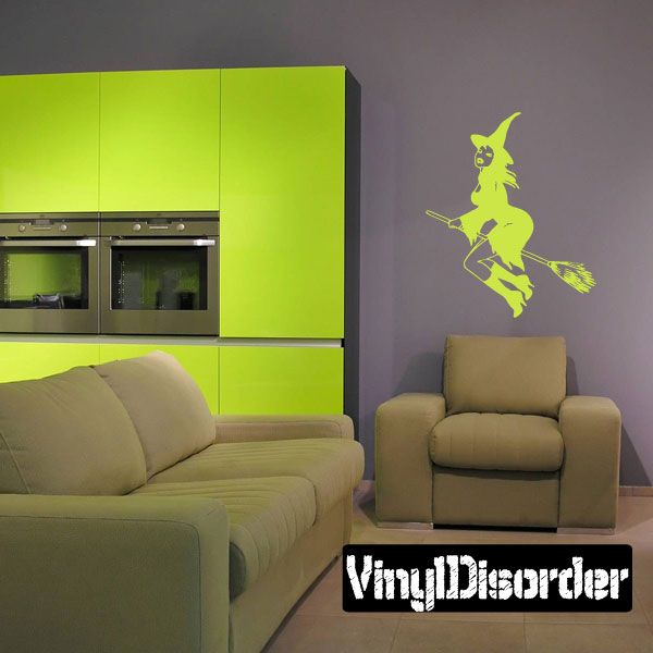 Flying fairy vinyl decal with broom silhouette, green outline