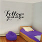 Wall decal with cursive Follow your arrow lettering