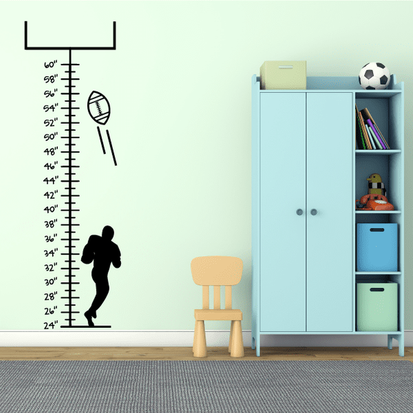Football goal post growth chart wall decal with ruler marks, football, and player silhouette