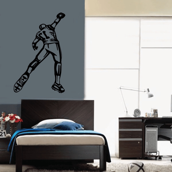 Black football player wall decal in mid-stride, holding a football