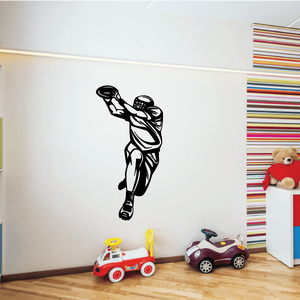 Football player wall decal, black vinyl silhouette of a throwing pose