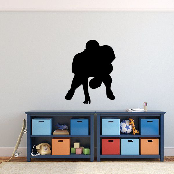 Football player wall decal, black vinyl silhouette with football pose