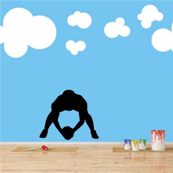 Football player wall decal, black silhouette kneeling with football, vinyl