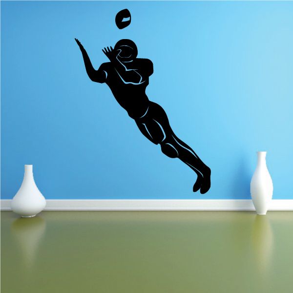 Football receiver diving catch wall decal, black silhouette of player reaching upward.