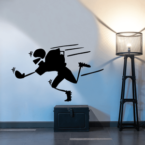 Football player wall vinyl decal with silhouette and action lines