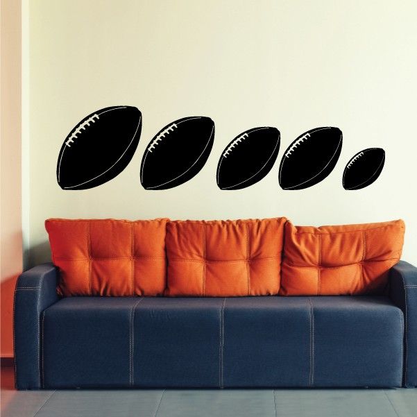 Set of black football decals with stitched white laces, five ball shapes