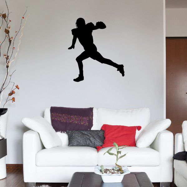Football player wall decal, black vinyl silhouette of two players in action pose