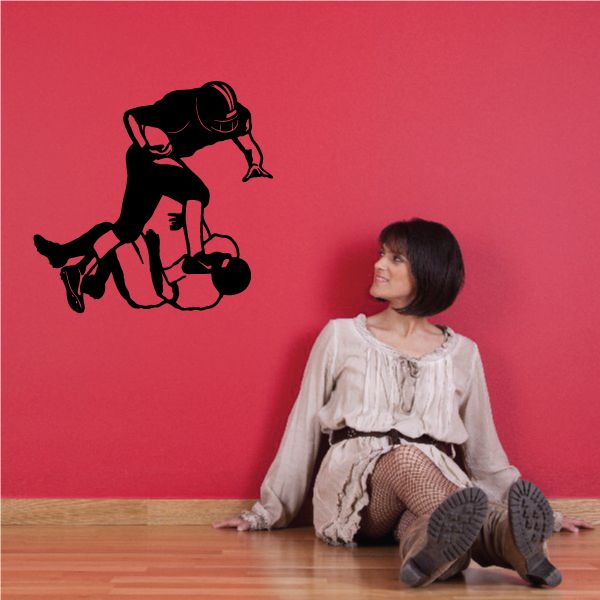 Football wall decal: black football player silhouette