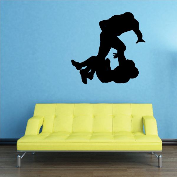 Football wall decal, black football player silhouette holding a helmeted ball