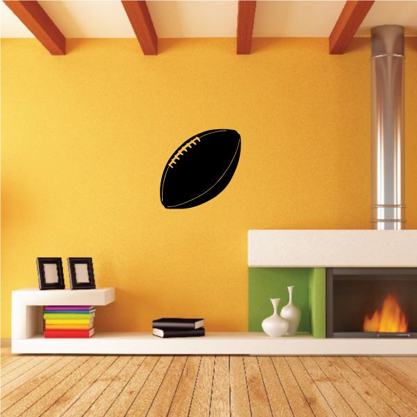 Football wall decal featuring a black American football shape.