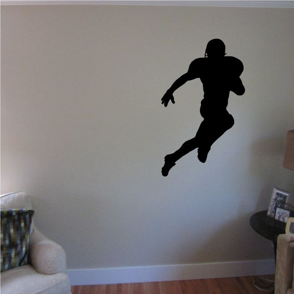 Football player wall decal, black vinyl running silhouette