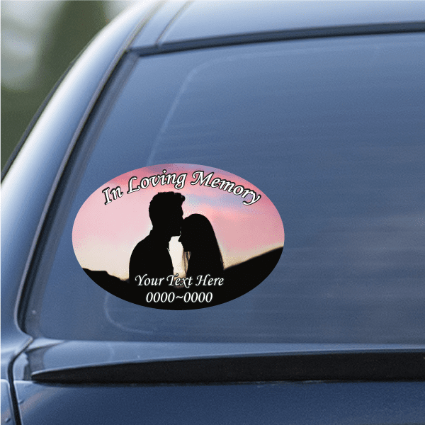 Oval car decal sticker with silhouetted couple and 'In Loving Memory' text.