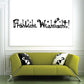 Happy Christmas wall decal with bold black lettering and star accents