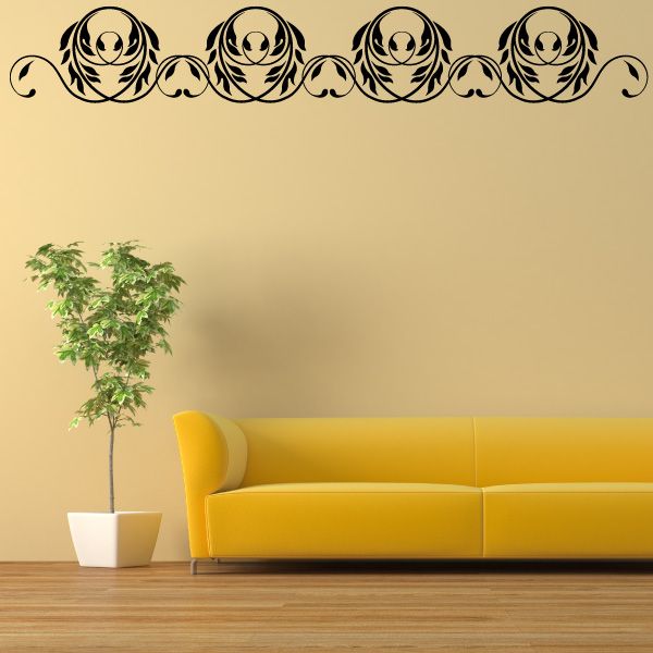 Floral frame wall decal with circular medallions and scrollwork border in black and gold