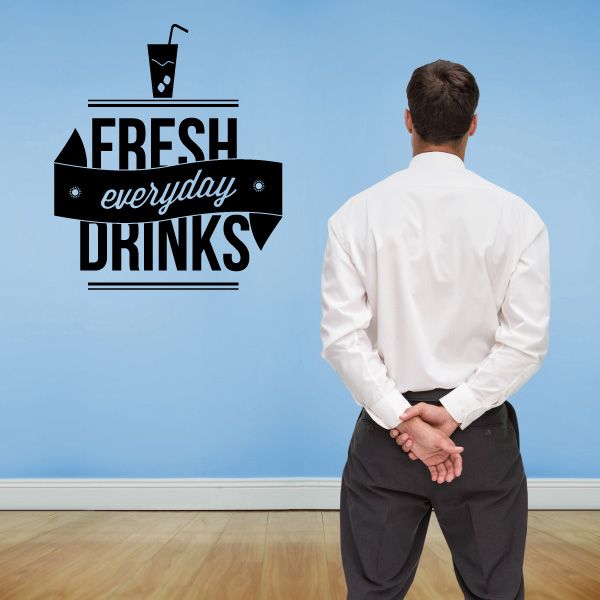 Wall decal text 'FRESH everyday DRINKS' with drink icon, black on white.