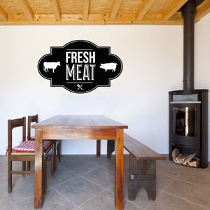Black Fresh Meat decal with white lettering and cow and pig icons
