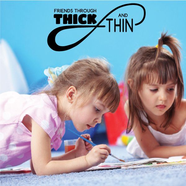 Wall decal with “Friends Through Thick and Thin” in bold black lettering