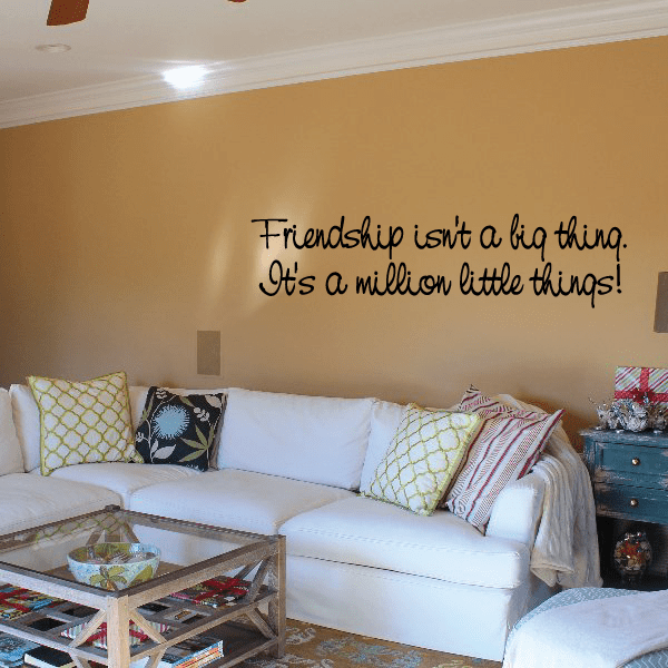 Wall decal with cursive quote: “Friendship isnt a big thing, Its a million little things!”