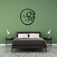 Black moon decal with playful face and star accents in a circular outline