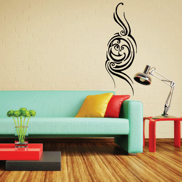 Black moon face wall decal with swirling eyes and curving nose detail