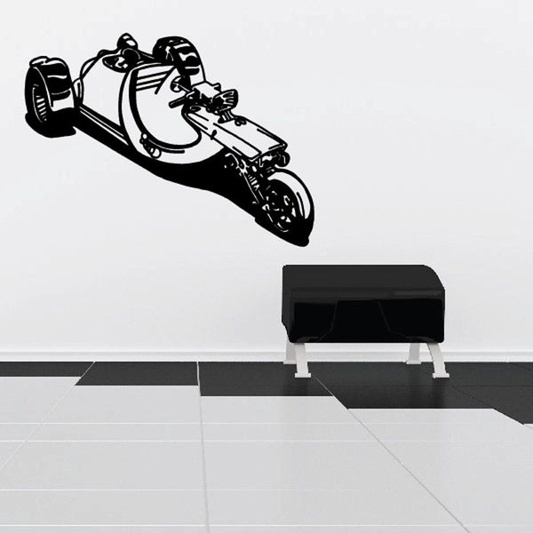 Trike decal with black-and-white futuristic rider and three wheels