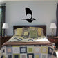 Black flying bird wall decal with curved wing silhouette