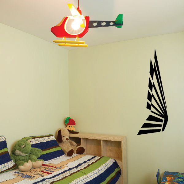 Black wing-shaped gas station wall decal with fan-like rays