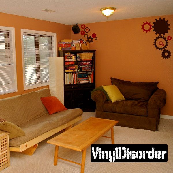 Wall gear decals kit with red and black cog shapes on wall
