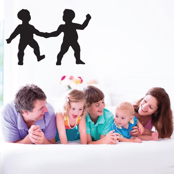 Dancing figures wall decal with two black silhouette figures holding hands