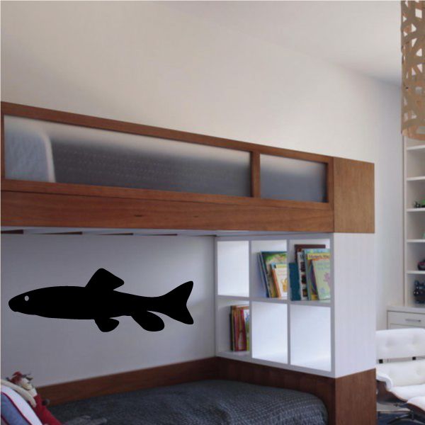 Swimming pike decal with black fish silhouette, wall-mounted