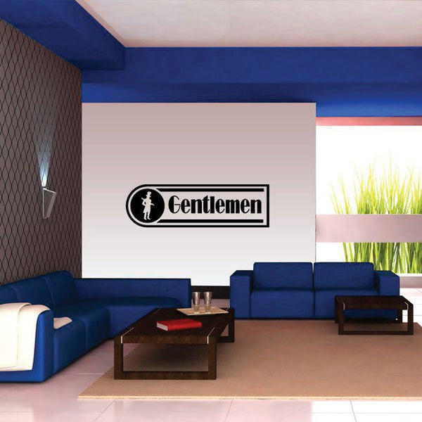 Bathroom wall decal with black circle icon and white “Gentlemen” lettering