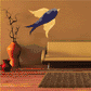 Geometric flying bird wall sticker with dark and light blue polygon shapes