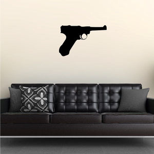 Handgun wall decal in black silhouette with small silver detail