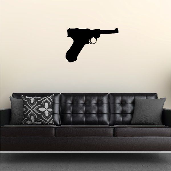 Handgun wall decal in black silhouette with small silver detail