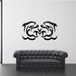 Twin dolphin gestural decal, black stylized dolphins facing inward